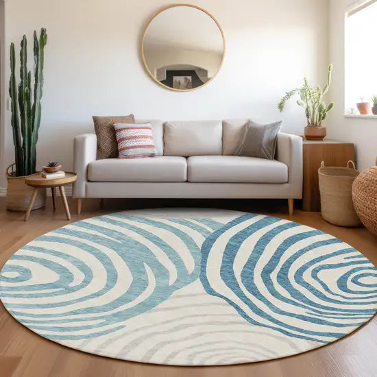 8' Teal Blue Ivory And Silver Round Abstract Washable Indoor Outdoor Area Rug Photo 6