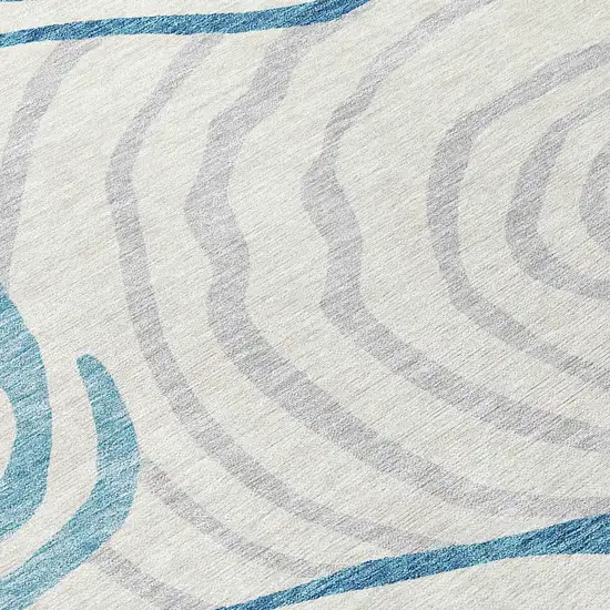 8' Teal Blue Ivory And Silver Round Abstract Washable Indoor Outdoor Area Rug Photo 8