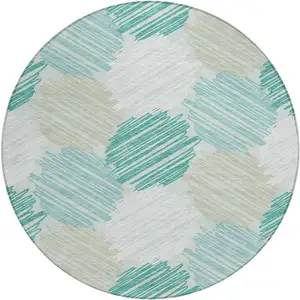 Photo of 8' Teal Blue Ivory And Taupe Round Geometric Washable Indoor Outdoor Area Rug