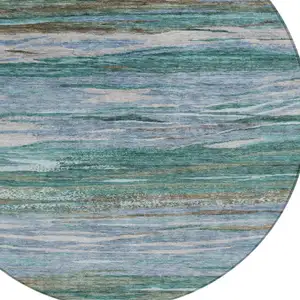 Photo of 8' Teal Blue Khaki And Taupe Round Abstract Washable Indoor Outdoor Area Rug