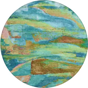 Photo of 8' Teal Blue Lime Green And Blush Round Abstract Washable Indoor Outdoor Area Rug