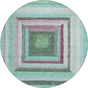 Photo of 8' Teal Blue Mauve And Ivory Round Geometric Washable Indoor Outdoor Area Rug