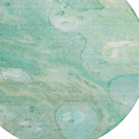 8' Teal Blue Mint Green And Ivory Round Abstract Washable Indoor Outdoor Area Rug Photo 9