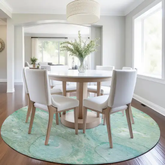 8' Teal Blue Mint Green And Ivory Round Abstract Washable Indoor Outdoor Area Rug Photo 6