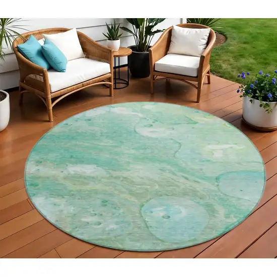 8' Teal Blue Mint Green And Ivory Round Abstract Washable Indoor Outdoor Area Rug Photo 2