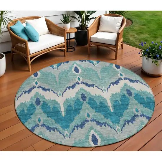 8' Teal Blue Navy Blue And Ivory Round Ikat Washable Indoor Outdoor Area Rug Photo 1