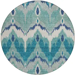 Photo of 8' Teal Blue Navy Blue And Ivory Round Ikat Washable Indoor Outdoor Area Rug