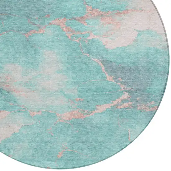 8' Teal Blue Peach And Ivory Round Abstract Washable Indoor Outdoor Area Rug Photo 8