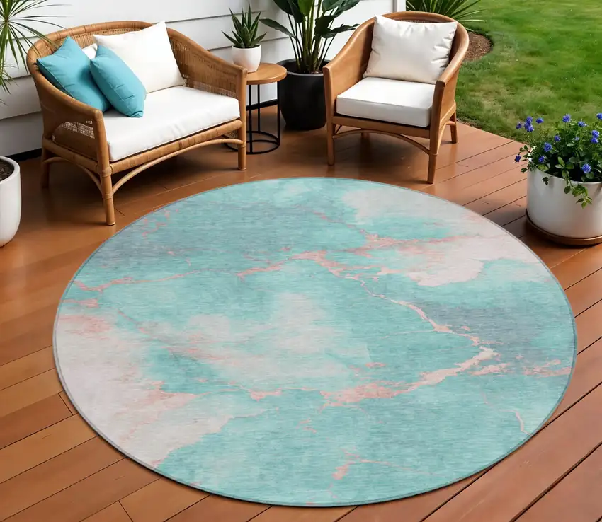 8' Teal Blue Peach And Ivory Round Abstract Washable Indoor Outdoor Area Rug Photo 2