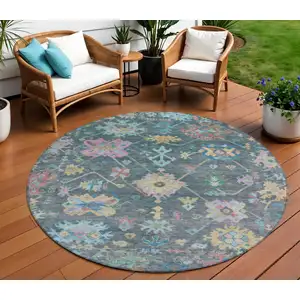 Photo of 8' Teal Blue Pink And Gold Round Floral Washable Indoor Outdoor Area Rug