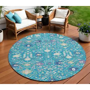 Photo of 8' Teal Blue Purple And Ivory Round Oriental Washable Indoor Outdoor Area Rug