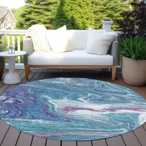 Photo of 8' Teal Blue Purple And Pink Round Abstract Washable Indoor Outdoor Area Rug