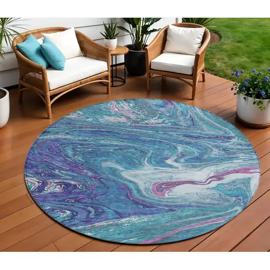 8' Teal Blue Purple And Pink Round Abstract Washable Indoor Outdoor Area Rug Photo 1