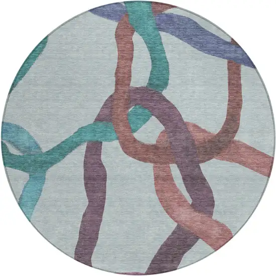 8' Teal Blue Red And Mauve Round Abstract Washable Indoor Outdoor Area Rug Photo 1