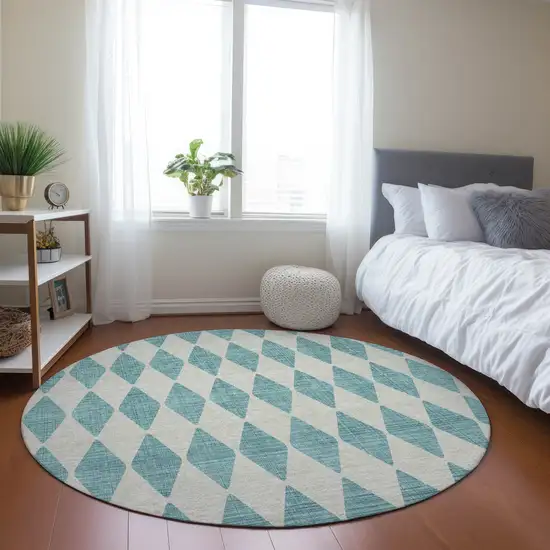 8' Teal Blue And Ivory Round Geometric Washable Indoor Outdoor Area Rug Photo 7