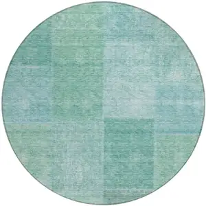 Photo of 8' Teal Blue Sage And Green Round Patchwork Washable Indoor Outdoor Area Rug