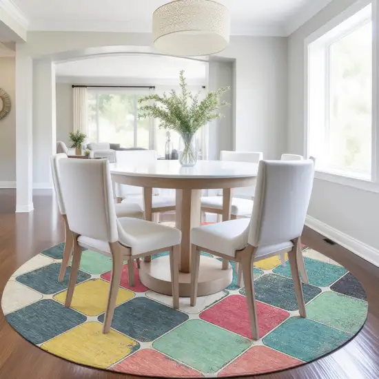 8' Teal Blue Salmon And Yellow Round Geometric Washable Indoor Outdoor Area Rug Photo 7