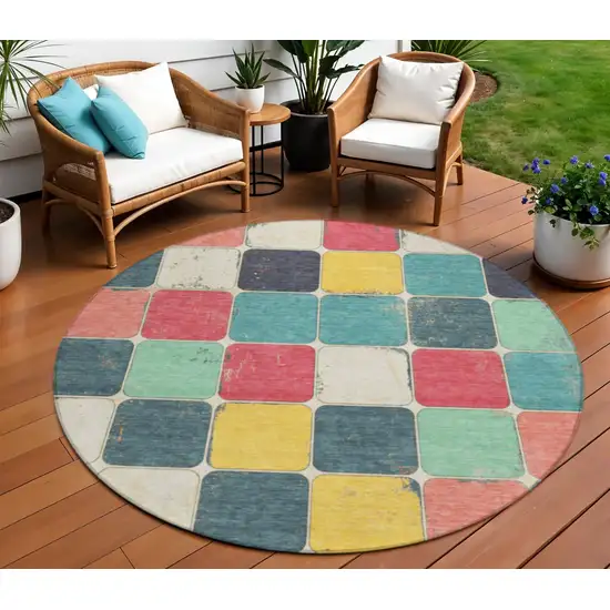 8' Teal Blue Salmon And Yellow Round Geometric Washable Indoor Outdoor Area Rug Photo 2