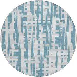 Photo of 8' Teal Blue Silver And Ivory Round Striped Washable Indoor Outdoor Area Rug