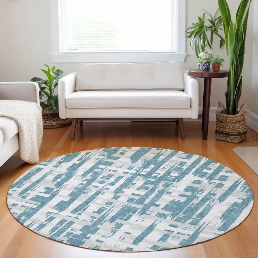 8' Teal Blue Silver And Ivory Round Striped Washable Indoor Outdoor Area Rug Photo 6