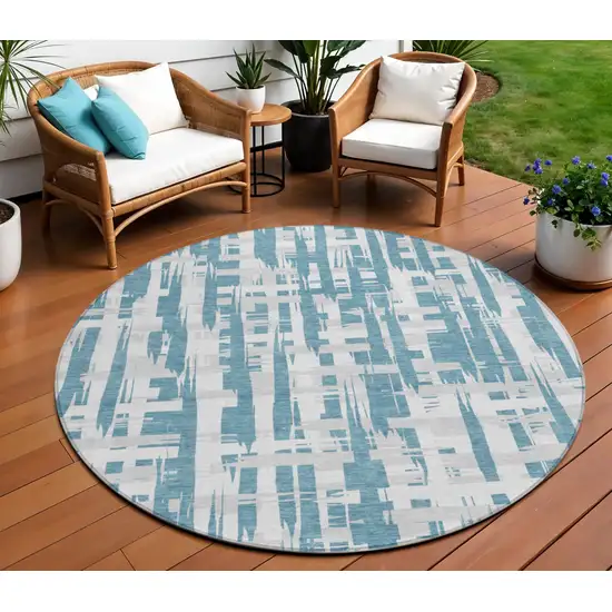 8' Teal Blue Silver And Ivory Round Striped Washable Indoor Outdoor Area Rug Photo 2
