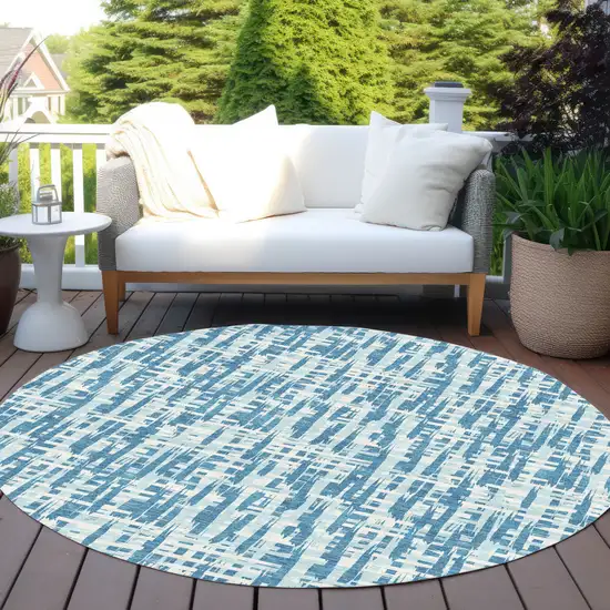 8' Teal Blue Sky Blue And Ivory Round Abstract Washable Indoor Outdoor Area Rug Photo 6
