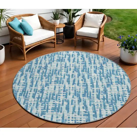 8' Teal Blue Sky Blue And Ivory Round Abstract Washable Indoor Outdoor Area Rug Photo 1