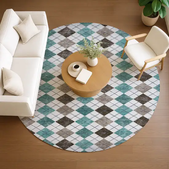 8' Teal Blue Taupe And Ivory Round Geometric Washable Indoor Outdoor Area Rug Photo 9
