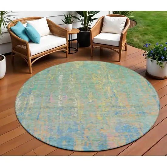 8' Teal Blue Yellow And Orange Round Abstract Washable Indoor Outdoor Area Rug Photo 2