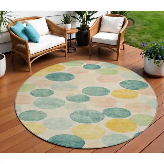 8' Teal Blue Yellow And Peach Round Geometric Washable Indoor Outdoor Area Rug Photo 2