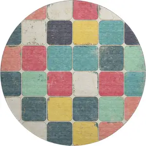 Photo of 8' Teal Blush And Yellow Geometric Washable Round Rug With UV Protection