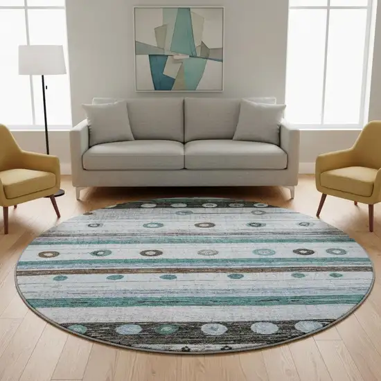 8' Teal Brown And Ivory Striped Washable Round Rug With UV Protection Photo 2