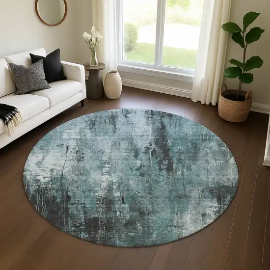 8' Teal Charcoal And Ivory Abstract Washable Round Rug With UV Protection Photo 4