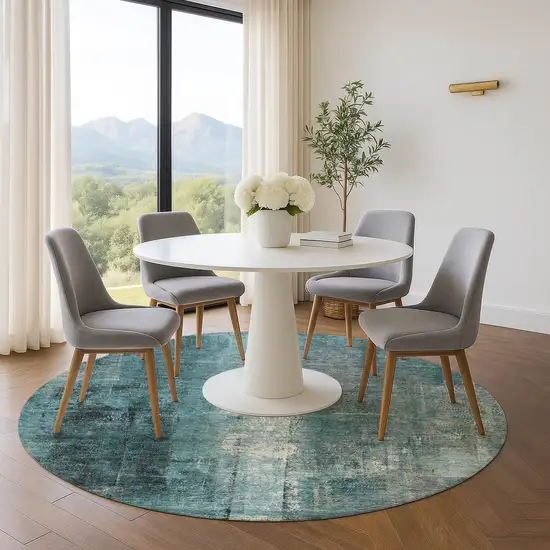 8' Teal Charcoal And Ivory Abstract Washable Round Rug With UV Protection Photo 5