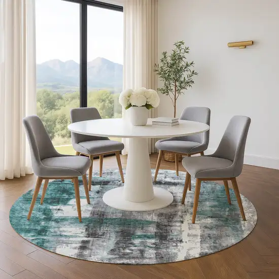 8' Teal Charcoal And Ivory Abstract Washable Round Rug With UV Protection Photo 5