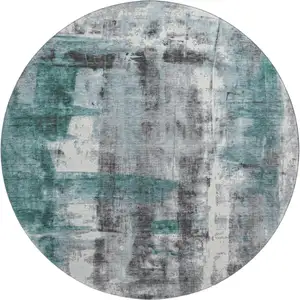 Photo of 8' Teal Charcoal And Ivory Abstract Washable Round Rug With UV Protection