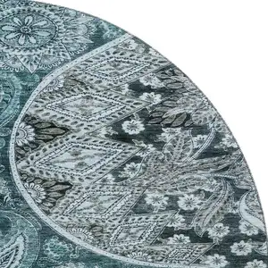 Photo of 8' Teal Charcoal And Ivory Paisley Washable Round Rug With UV Protection