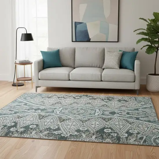 8' Teal Charcoal And Ivory Paisley Washable Round Rug With UV Protection Photo 2