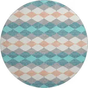 Photo of 8' Teal Coral And Ivory Geometric Washable Round Rug With UV Protection