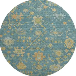 Photo of 8' Teal Gold And Blue Floral Washable Round Rug With UV Protection