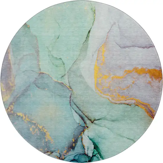 8' Teal Gold And Ivory Abstract Washable Round Rug With UV Protection Photo 1