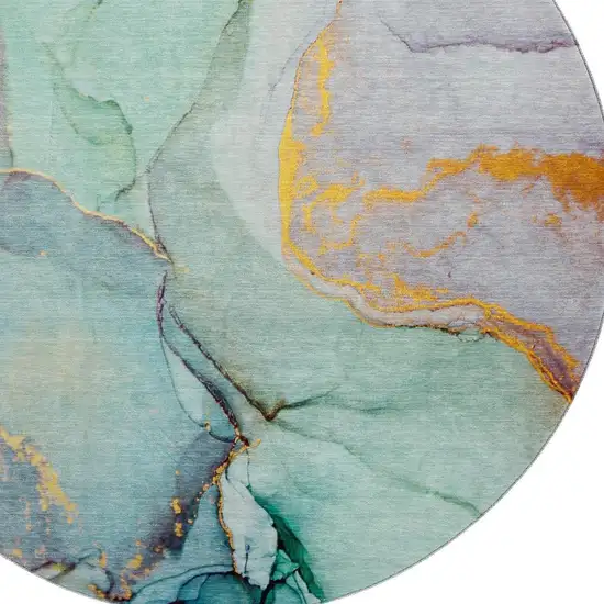 8' Teal Gold And Ivory Abstract Washable Round Rug With UV Protection Photo 3