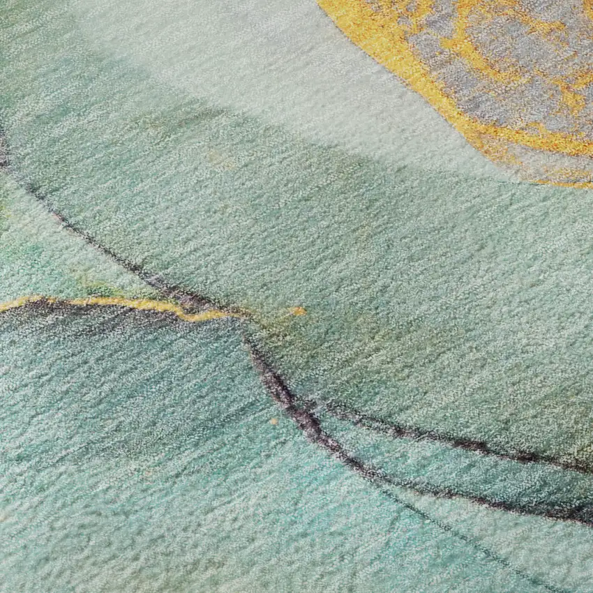 8' Teal Gold And Ivory Abstract Washable Round Rug With UV Protection Photo 9