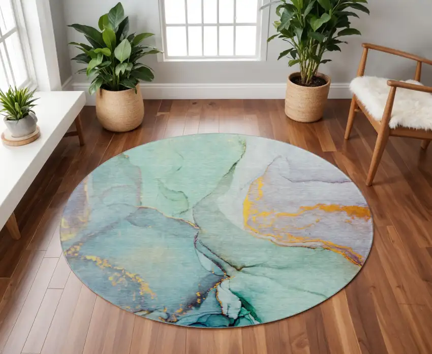 8' Teal Gold And Ivory Abstract Washable Round Rug With UV Protection Photo 2