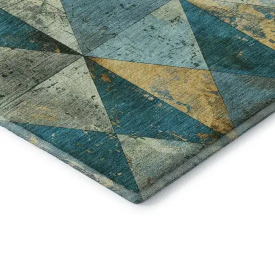 8' Teal Gold And Ivory Geometric Washable Round Rug With UV Protection Photo 5