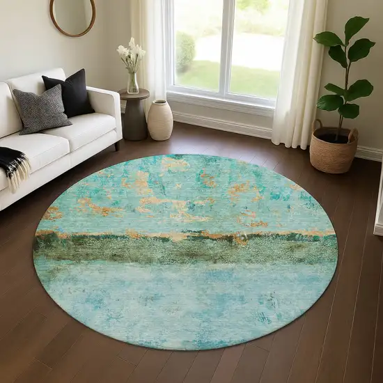8' Teal Gold And Olive Green Abstract Washable Round Rug With UV Protection Photo 4