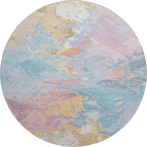 Photo of 8' Teal Gold And Pink Abstract Washable Round Rug With UV Protection