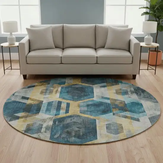 8' Teal Gold And Silver Geometric Washable Round Rug With UV Protection Photo 2
