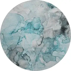 Photo of 8' Teal Gray And Ivory Abstract Washable Round Rug With UV Protection