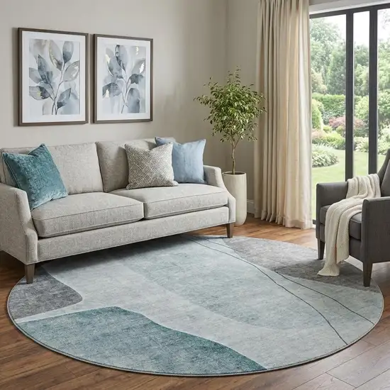 8' Teal Gray And Ivory Abstract Washable Round Rug With UV Protection Photo 1